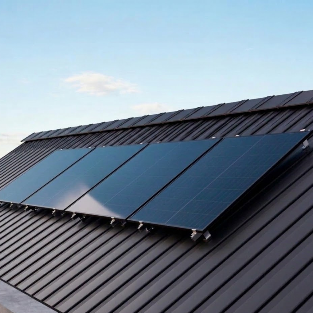 Solar panels on a metal roof with a clear sky